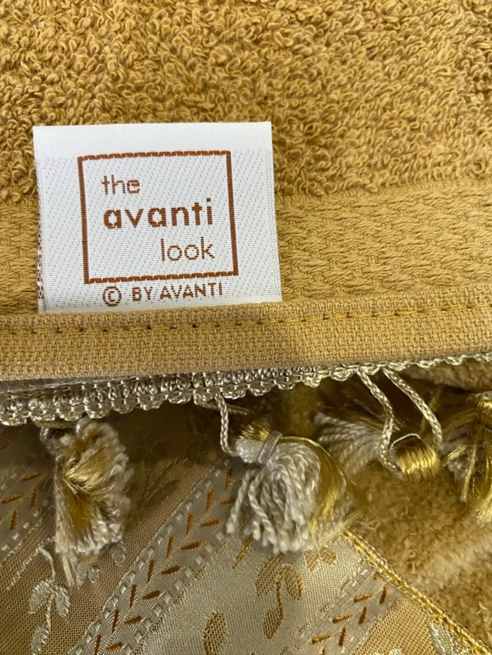 Avanti Mustard Decorative Hand Towel with Tassel Border